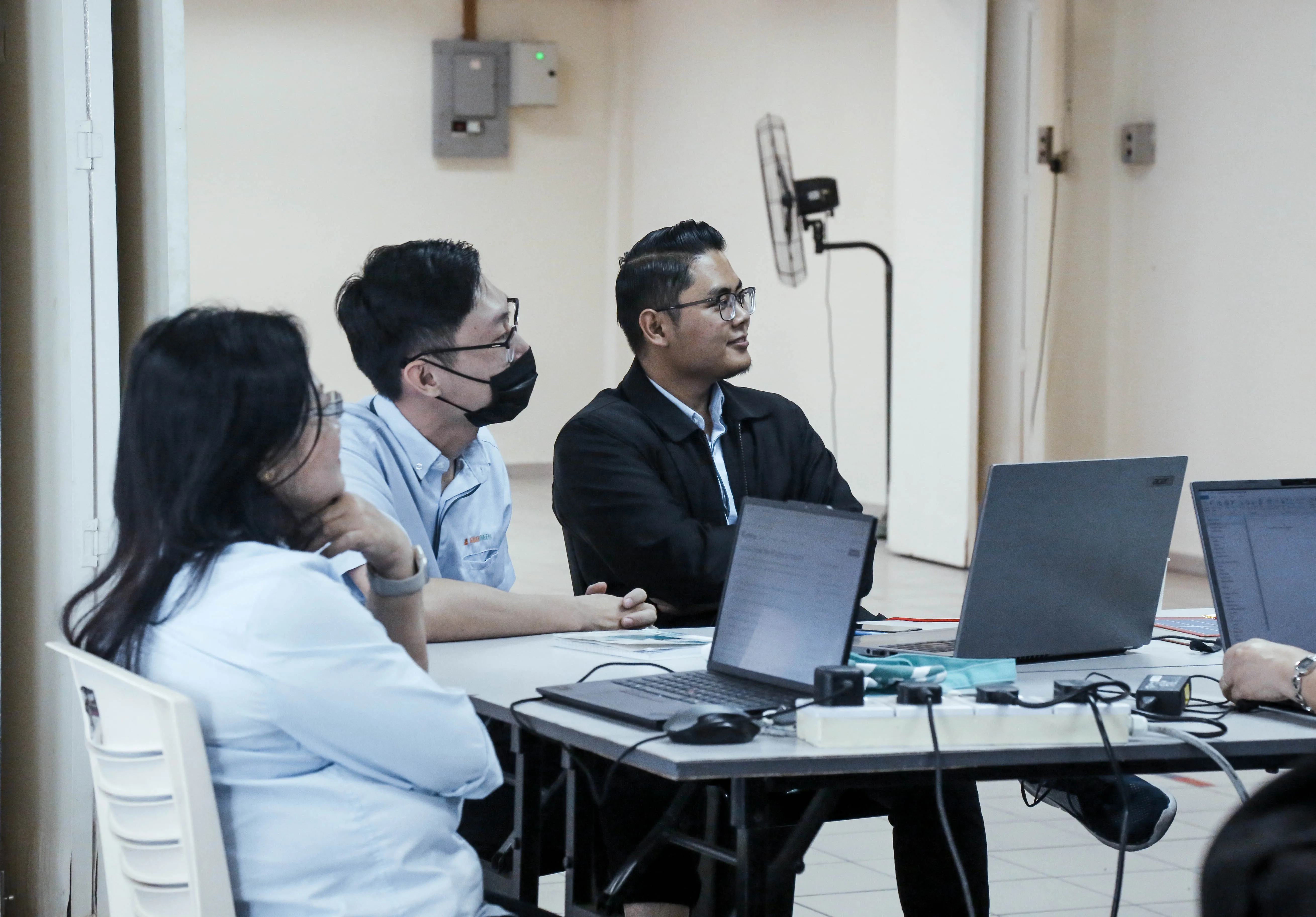 Participants following an AI training session.